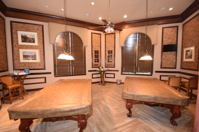 playroom with light parquet flooring, ceiling fan, ornamental molding, and billiards