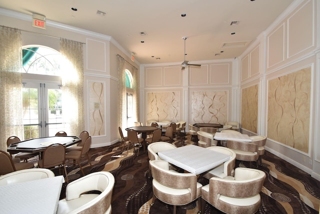 dining area with french doors, ceiling fan, and crown molding