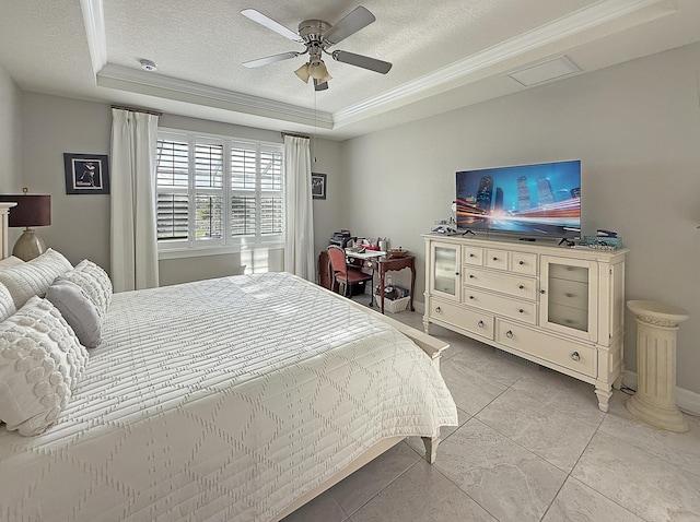 12880 SW Aureolian Ln, Port Saint Lucie, FL 34987 - bedroom with a textured ceiling, a raised ceiling, ceiling fan, crown molding, and light tile patterned floors