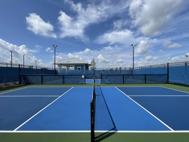 view of tennis court with basketball court