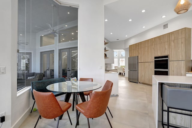 dining room featuring french doors and ceiling fan