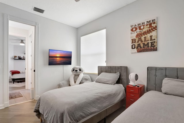 bedroom with wood-type flooring