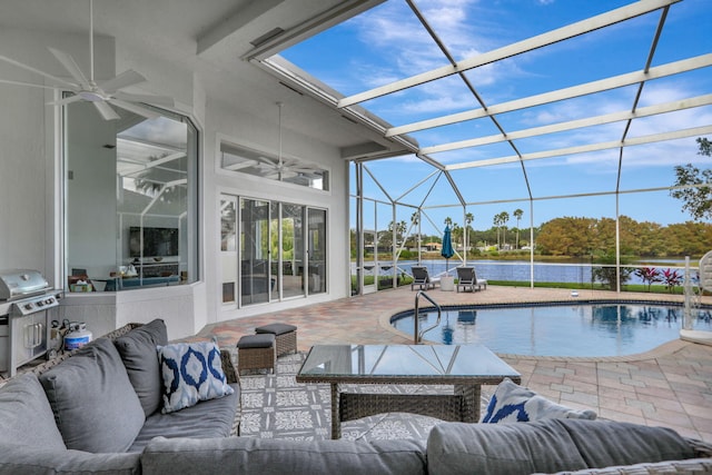 view of swimming pool featuring an outdoor living space, glass enclosure, a patio, and grilling area