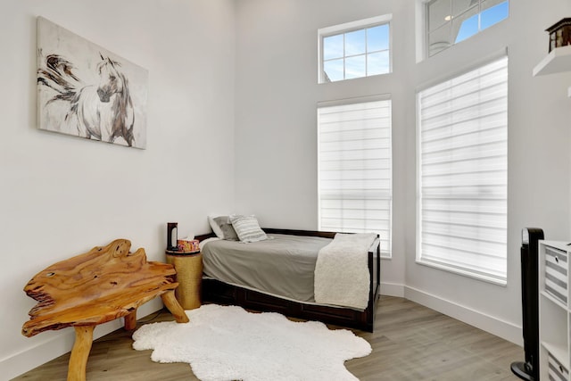 bedroom with light wood-type flooring