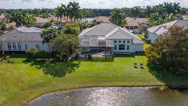 drone / aerial view with a water view