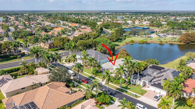 bird's eye view with a water view