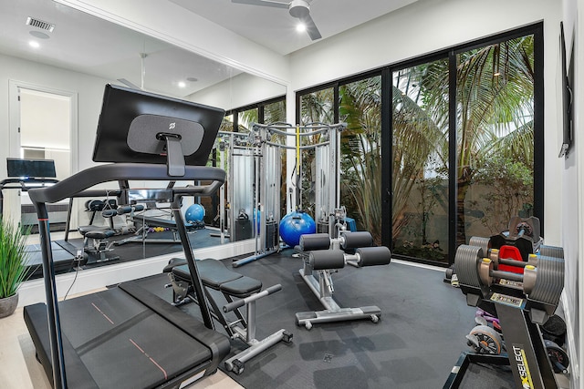 workout room featuring ceiling fan