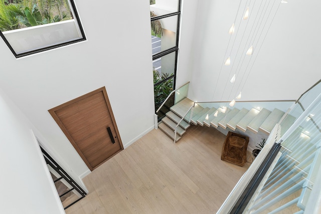 staircase featuring hardwood / wood-style flooring