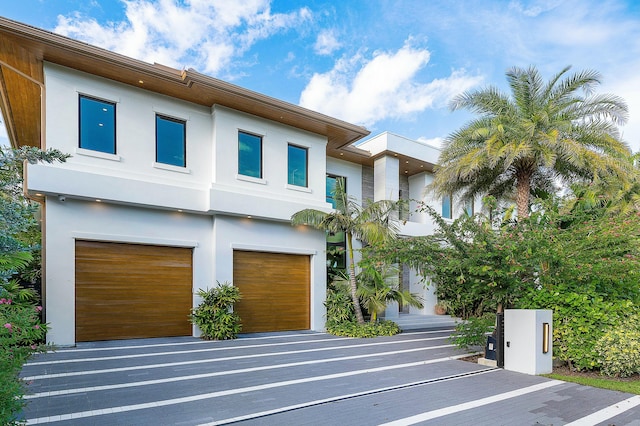 modern home featuring a garage