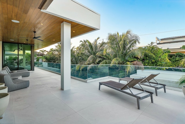 view of pool featuring a patio and ceiling fan