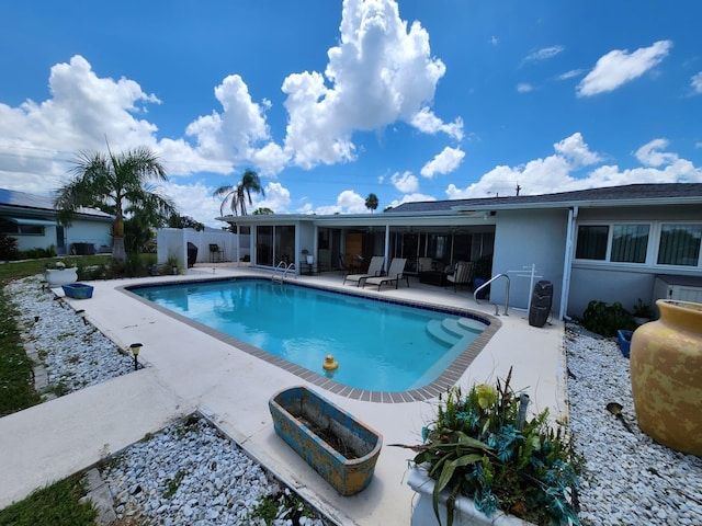 view of pool featuring a patio area