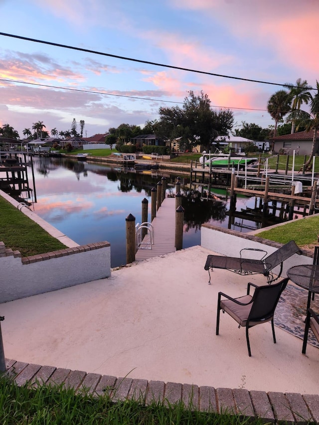 dock area with a water view