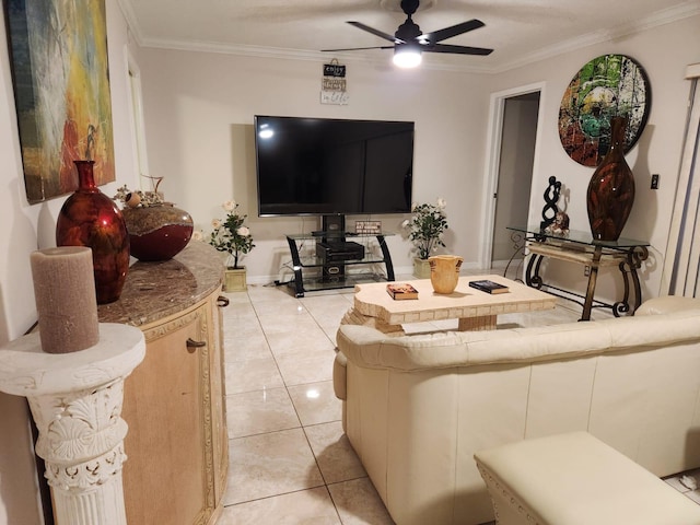 tiled living room featuring ceiling fan and ornamental molding