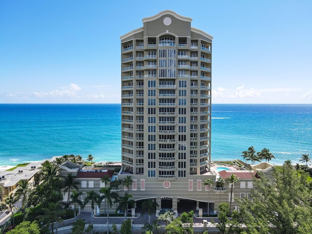 view of building exterior with a water view