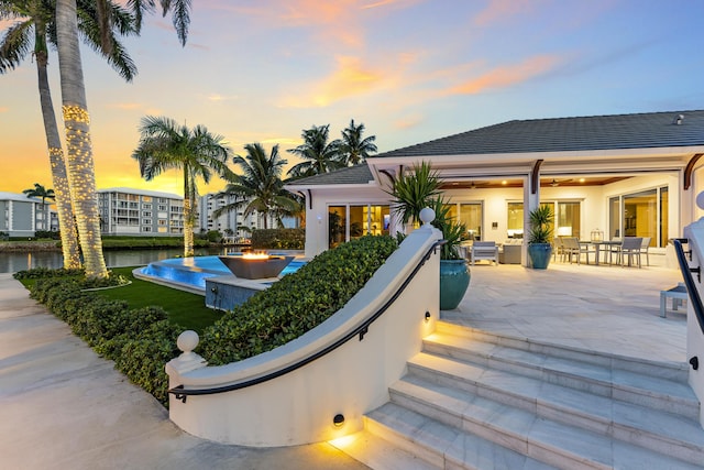 view of property's community featuring a patio