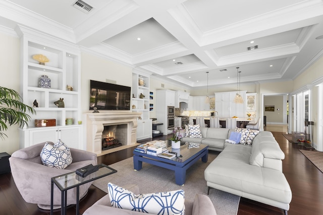 living room with built in shelves, coffered ceiling, beamed ceiling, dark hardwood / wood-style floors, and ornamental molding