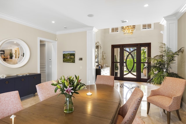 dining area featuring a chandelier and ornamental molding