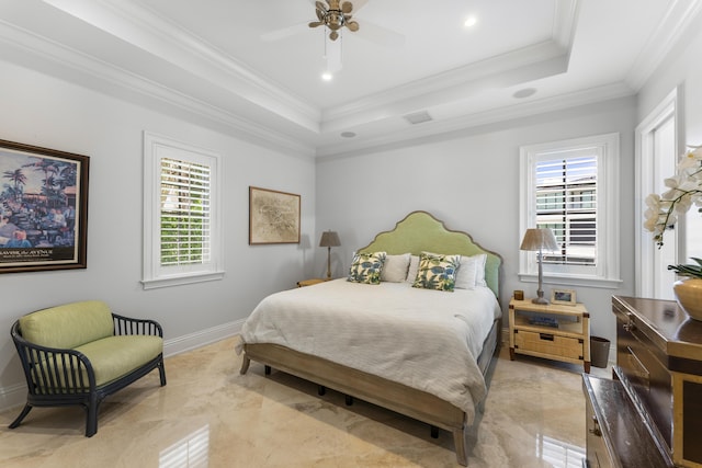 bedroom with a tray ceiling, ceiling fan, and crown molding