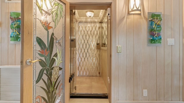 interior space featuring wood walls