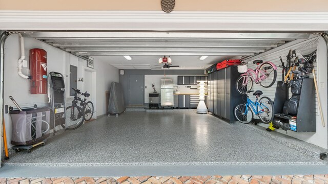 view of front facade with a balcony and a garage