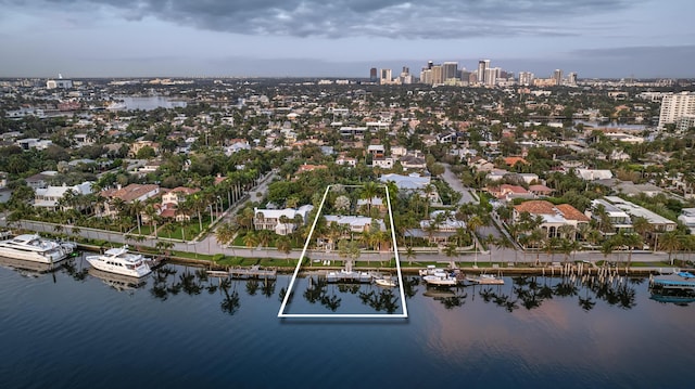 aerial view with a water view and a view of city