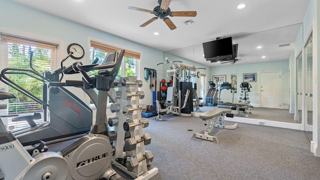 exercise room with recessed lighting, a healthy amount of sunlight, and visible vents