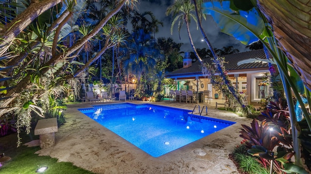 pool featuring a patio