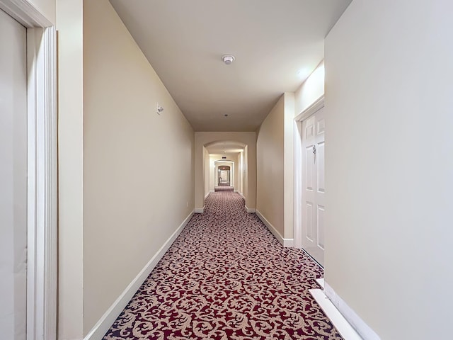 hallway with carpet