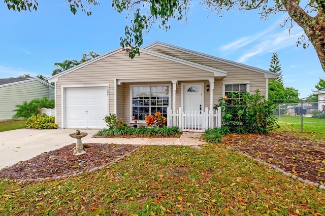 ranch-style house with a garage and a front lawn