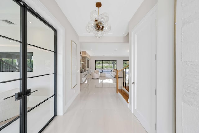 hall with light tile patterned flooring