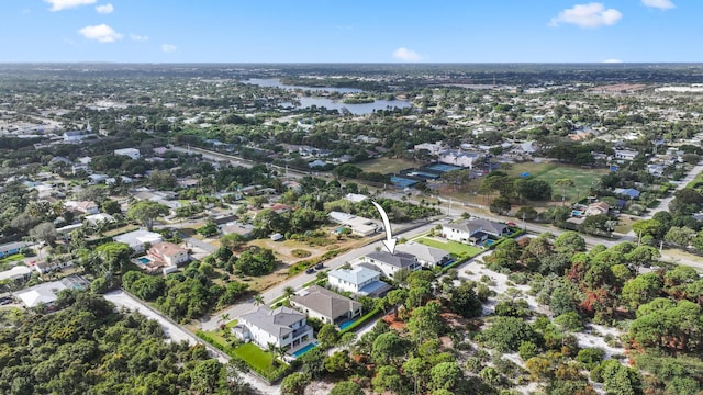 drone / aerial view with a water view