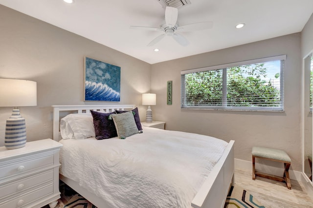 bedroom featuring light hardwood / wood-style floors and ceiling fan