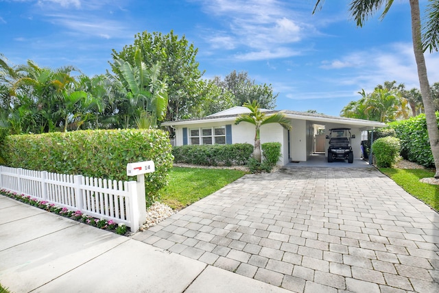 single story home with a carport