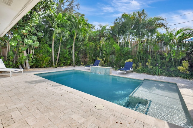 view of swimming pool featuring a patio