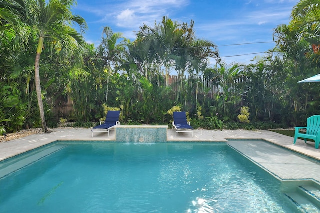 view of swimming pool featuring a patio