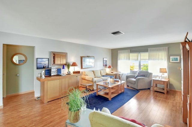 living room featuring light hardwood / wood-style floors