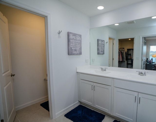 bathroom featuring vanity and tile patterned floors