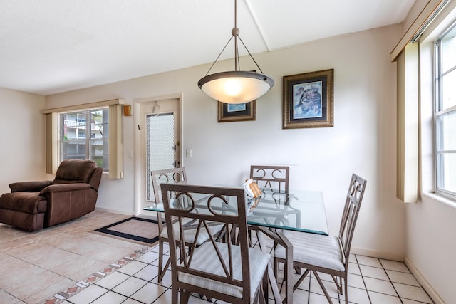 dining room featuring light tile patterned floors