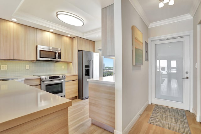 kitchen with decorative backsplash, appliances with stainless steel finishes, and light brown cabinets