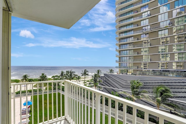 balcony featuring a water view