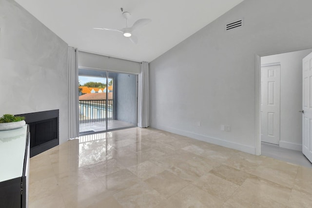 unfurnished living room with vaulted ceiling and ceiling fan