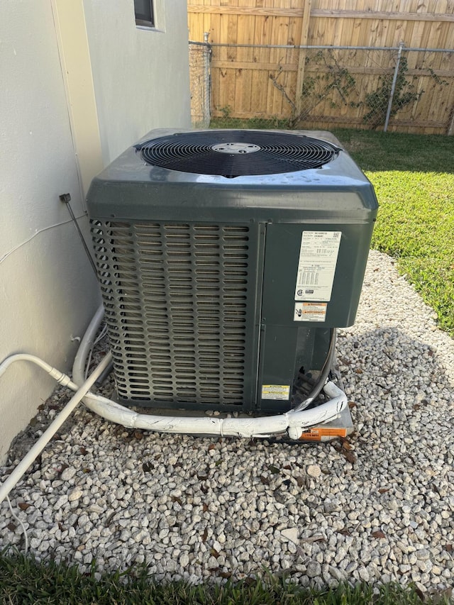 3015 Robert Rd, West Palm Beach, FL 33405 - exterior details featuring central AC unit