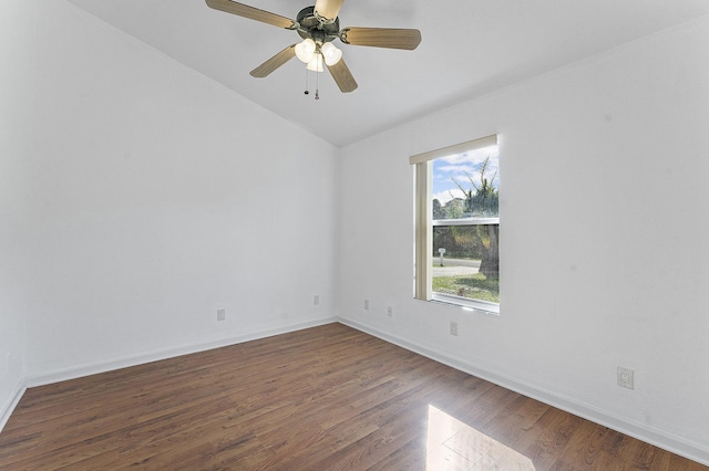 spare room featuring lofted ceiling, ceiling fan, and dark hardwood / wood-style floors