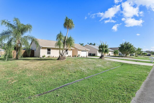 ranch-style home with a front yard