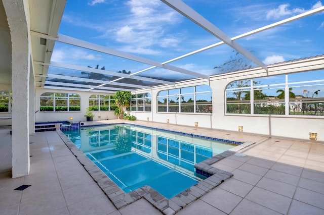 view of pool featuring a patio area and a lanai