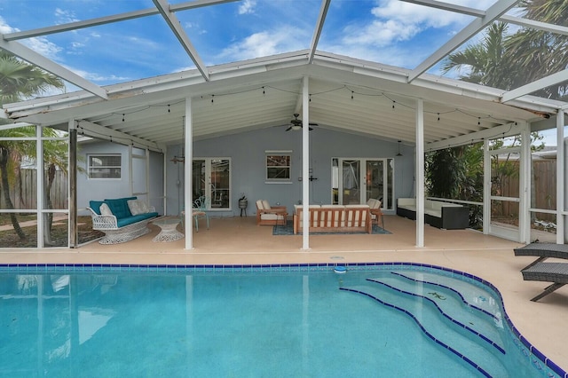 view of swimming pool with an outdoor hangout area, a patio, and ceiling fan