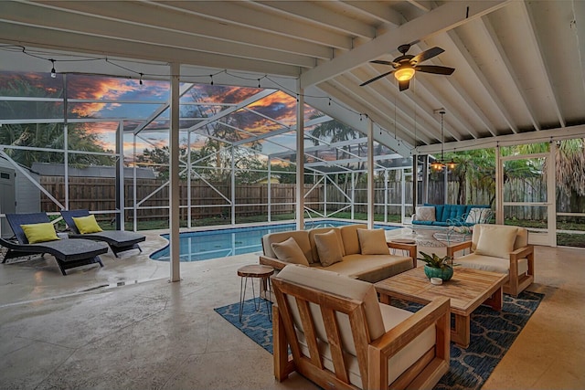 exterior space featuring a patio, an outdoor living space, and glass enclosure