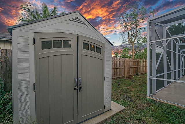 view of outdoor structure at dusk