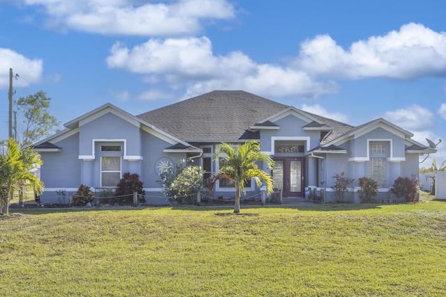 view of front facade featuring a front yard