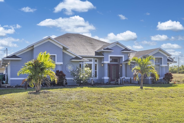 view of front facade with a front lawn